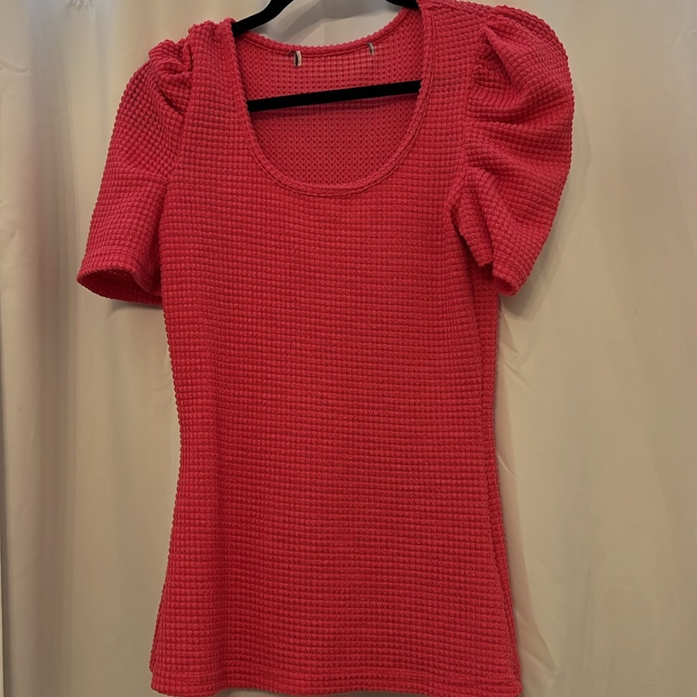 Textured pink top with bubble detail sleeves. Never worn. Accidentally bought 2